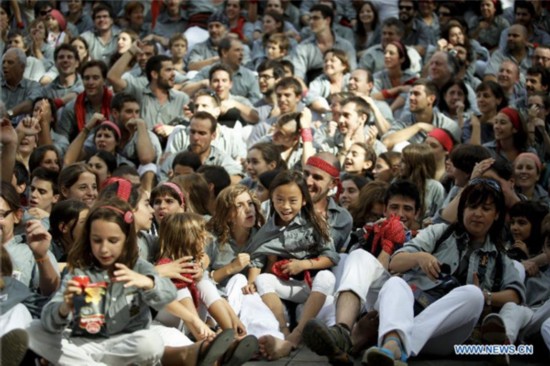 Chinese girl in local Spanish human tower team