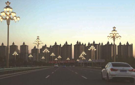 尔多斯举报式逼债波及官场 官员们忙着退地退钱