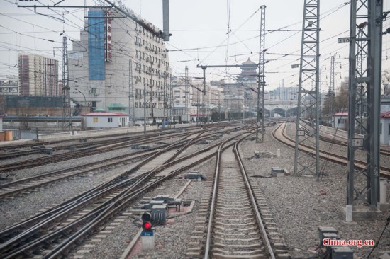 Song Jian and Ding Hailong have long been familiar with such seemingly complex railway turnouts. Song says that by looking at them almost every day, he can instantly tell whether they are in the right position. [Photo by Chen Boyuan / China.org.cn]