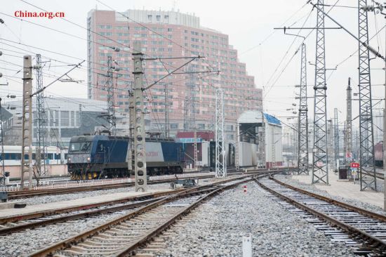 Song Jian and Ding Hailong are very familiar with such seemingly complex railway turnouts. Song says that by looking at them almost every day, he can instantly tell whether they are in the right position. [Photo by Chen Boyuan / China.org.cn]