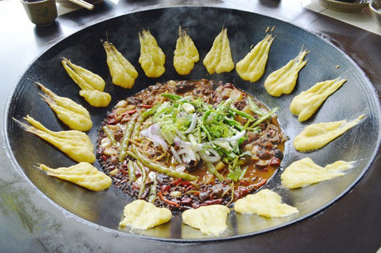 昆明叫停柴火鸡 现存店铺禁烧柴火