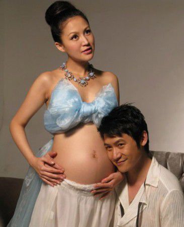 传刘诗诗怀孕吴奇隆默认 挺大肚现身机场被拍照(图)
