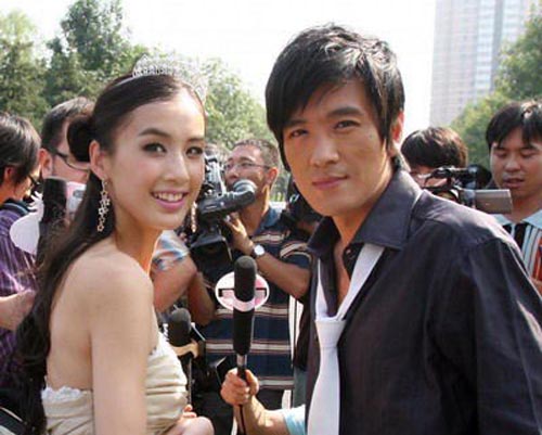 杨子与新欢张羽熙牵手蜜游 黄圣依正宫地位恐