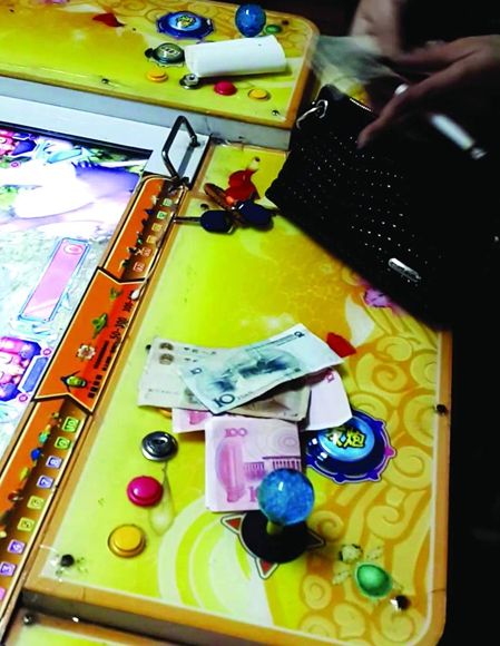 男子举报打鱼机窝点 收到死亡电话威胁(图)