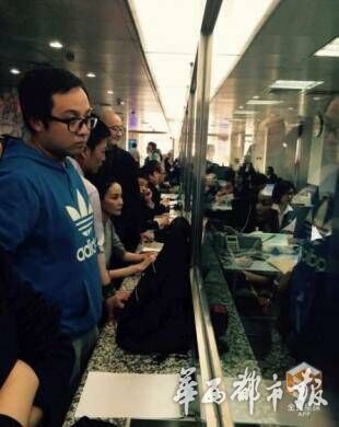 王菲办理房地产业务 北京多名公务员离岗围观