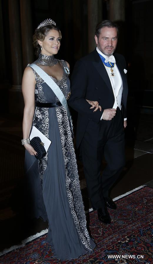 Sweden's Princess Madeleine and her husband Christopher O'Neill attend the royal banquet for Nobel laureates at Royal Palace in Stockholm, Sweden, Dec. 11, 2015.