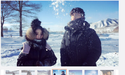 张馨予穿鱼尾羽绒服雪地留影 与男演员撒欢玩