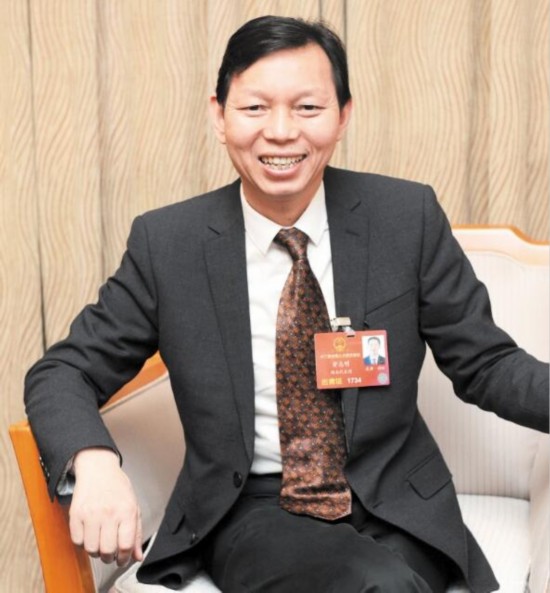 全国人大代表黄志明:取消土地出让使用年限