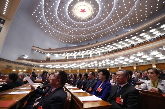 3月16日,第十二届全国人民代表大会第四次会议在北京人民大会堂举行闭幕会。新华社记者 鞠鹏 摄