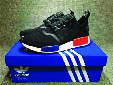 上海2千人为阿迪新款鞋连夜排队 现场混乱警察