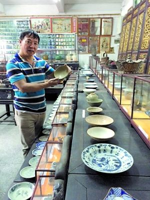 雷伟亮和他的藏品