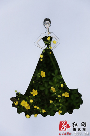 临武县小学生用春景做花裙 创意裁剪呼吁文明