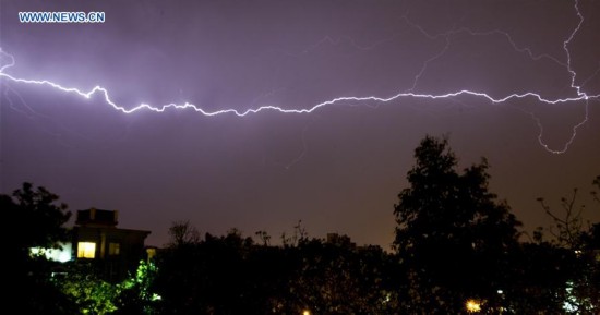 Lightenings are seen in the sky of New Delhi, India, May 23, 2016. 