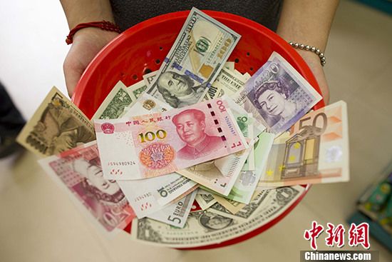 人民币正式入篮 外资金融机构预计中国资本账