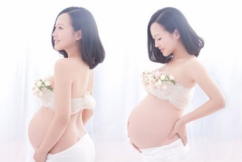 看女星斗艳孕照大比拼     潘长江女儿潘阳的婚纱照十分的清新,轻纱拢