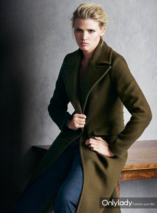 Lara Stone embraces tomboy style in an army green coat for Marc OPolos fall
