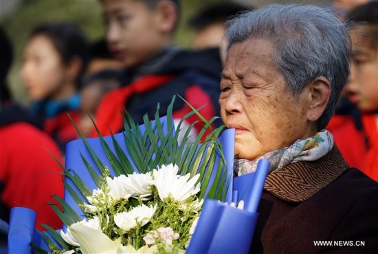  A series of ceremonies were held by people to mourn their family members killed in the 1937 massacre ahead of the National Memorial Day for Nanjing Massacre Victims, which falls on Dec. 13. Japanese troops captured Nanjing, then China's capital, on Dec. 13 of 1937 and started a campaign of slaughter lasting longer than a month. 