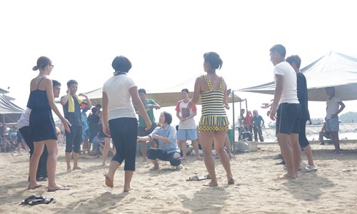 Students play on a beach on their day off. Photo: Courtesy of Sarah