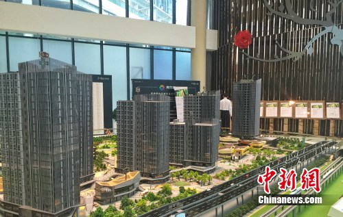 資料圖：樓盤銷售中心。<a target='_blank'  data-cke-saved-href='http://www.chinanews.com/' href='http://www.chinanews.com/' _fcksavedurl='http://www.chinanews.com/' ></table><p  align=