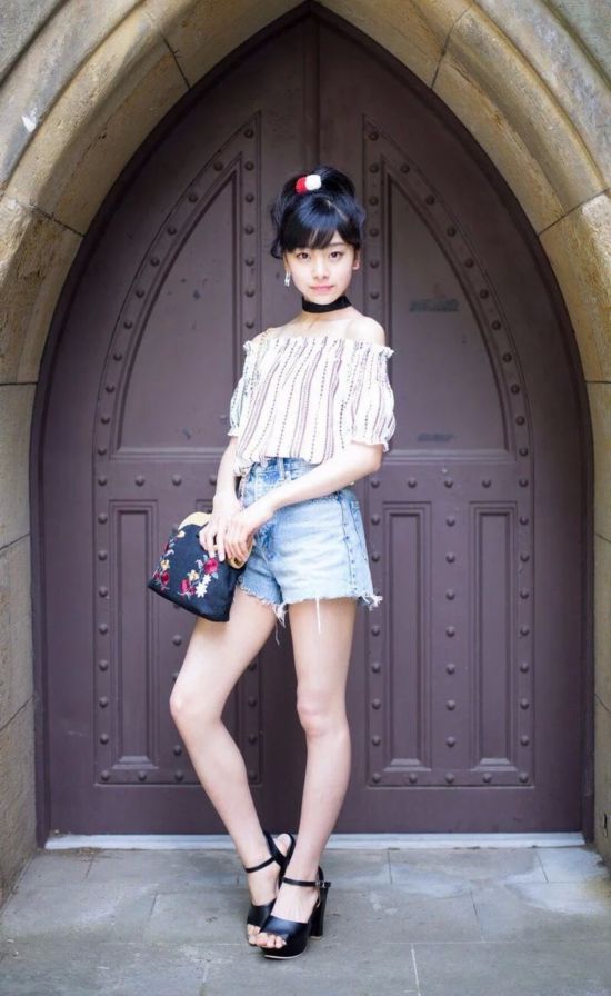 日本12岁小学生进军模特业 担任赛车女郎引争