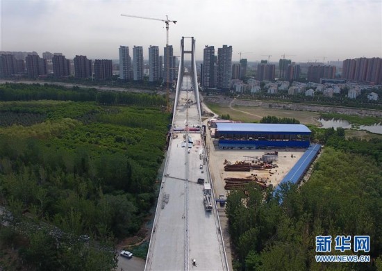 潮白河大桥顺利合龙 年底前具备通车条件