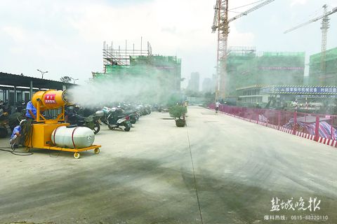 盐城市区建筑工地巧降尘 工程车需 洗个澡 再上