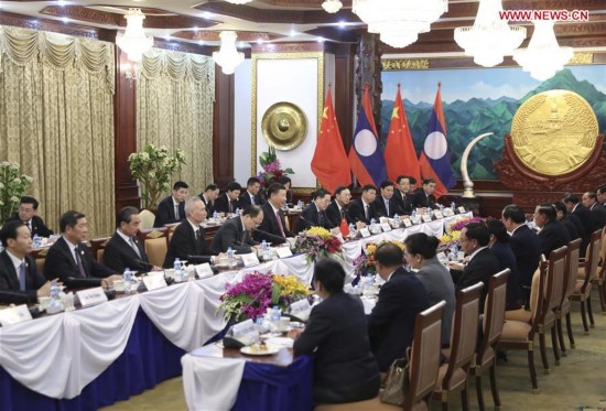 LAOS-CHINA-XI JINPING-BOUNNHANG VORACHIT-TALKS