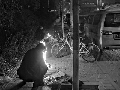 当街烧纸钱污染环境藏火患 "寒衣节"应文明祭奠