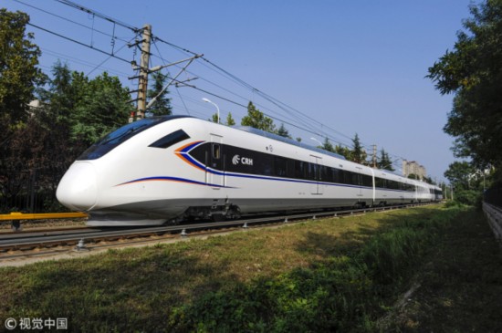 A CRH bullet train runs on a railway track. [File Photo: VCG]