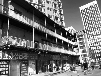 朝阳国美公寓52块违规牌匾全拆除