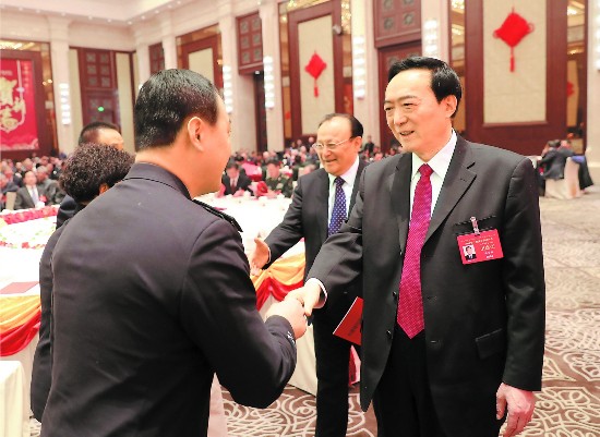 新疆维吾尔自治区举行2018年春节团拜会 陈全