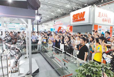 人民日报:江苏昆山七办进口交易会 实现外贸由