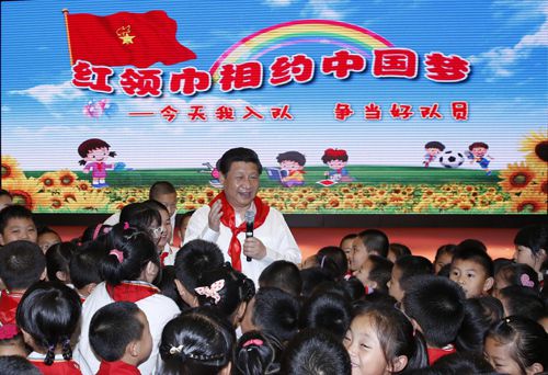 President Xi Jinping celebrates International Children's Day in Beijing at Haidian Minzu Primary School on May 30, 2014. [Photo: China Plus]