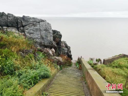 守岛32年坚持升国旗 王继才:岛就是家,家就是国