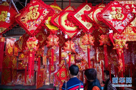 年桔,年花,年菜里的"年味儿"——澳门年宵市场见闻