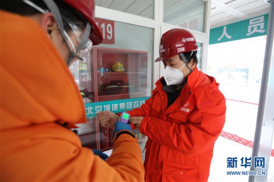 雪中战“疫”：探访风雪中复工的北京建筑工地