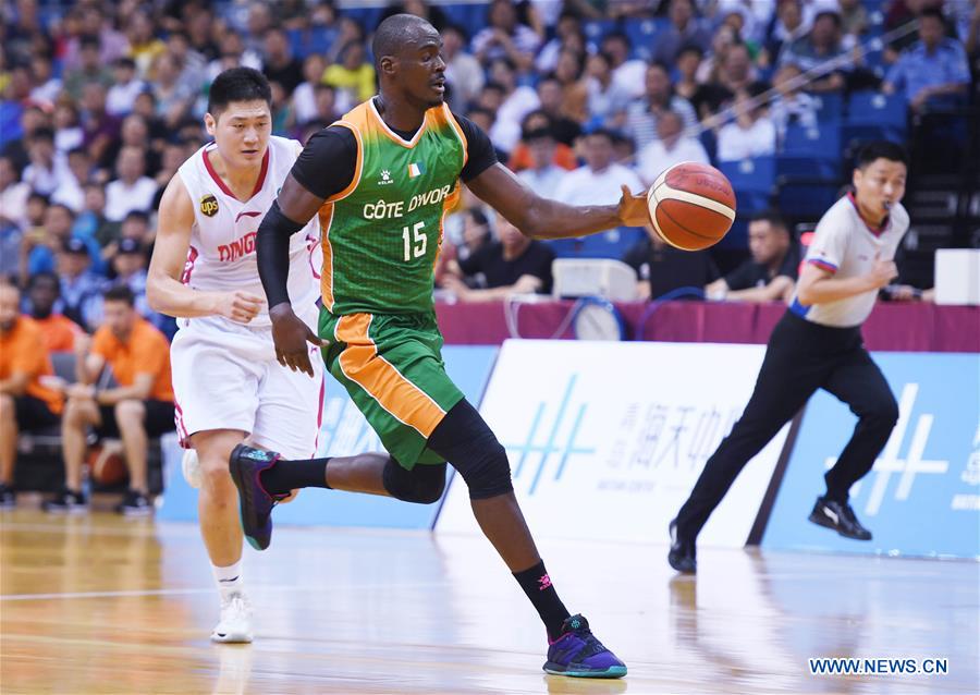 (SP)CHINA-QINGDAO-BASKETBALL-QINGDAO DOUBLE STAR VS COTE D'IVOIRE (CN)