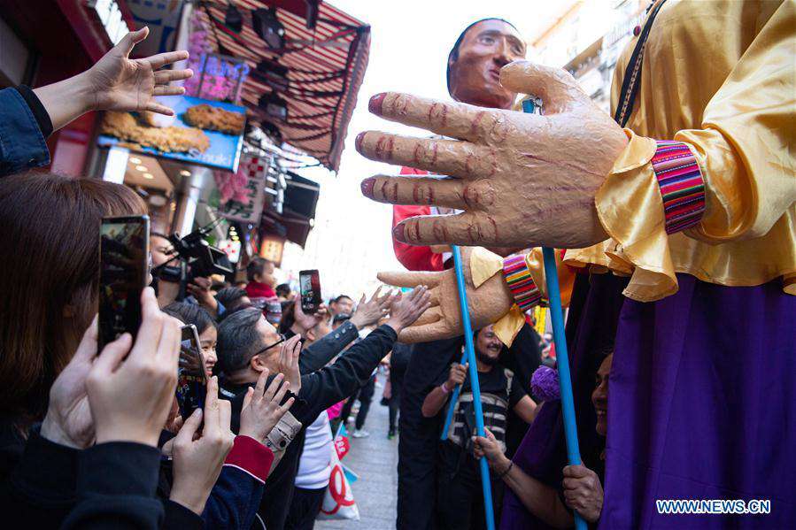 Parade held to celebrate 20th anniversary of Macao's return to motherland