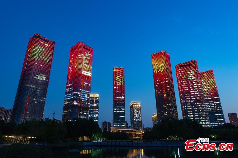 High-rise buildings in Beijing light up for July 1