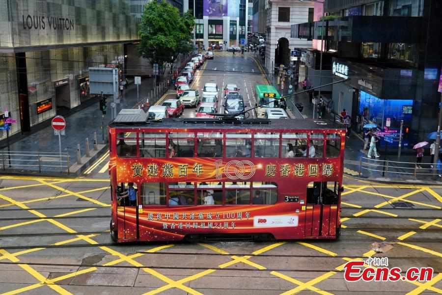 HK trams decorated for CPC's 100th anniversary and 24th anniversary of its return