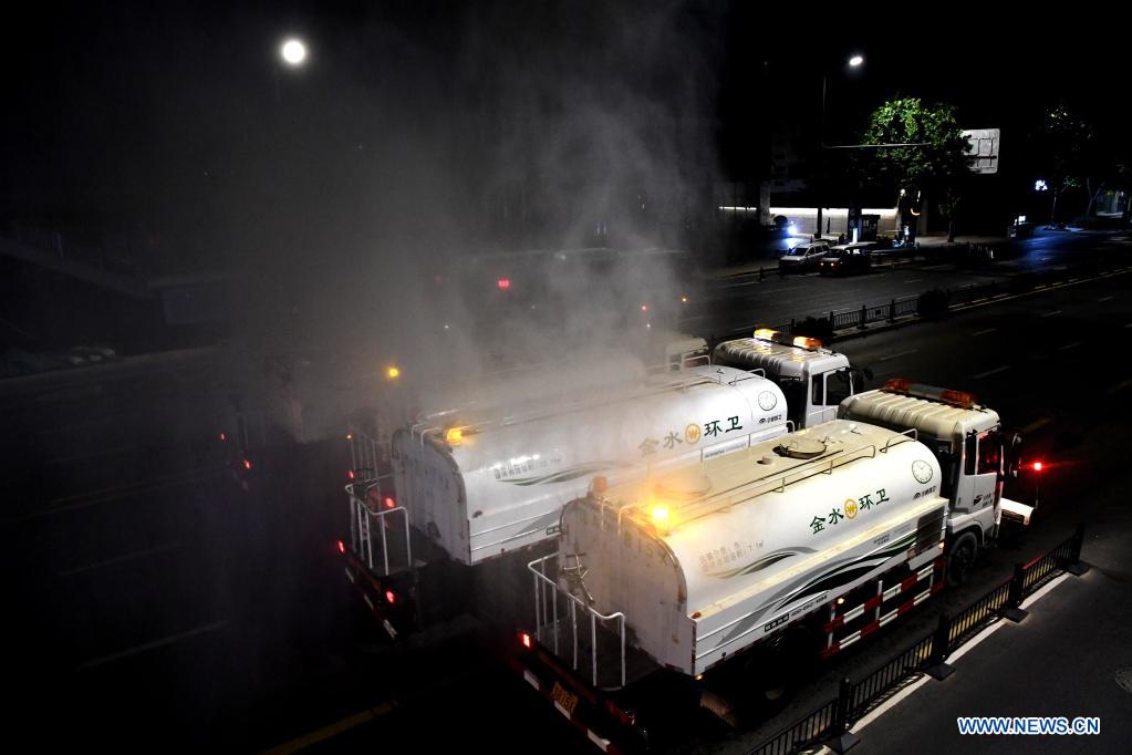 Vehicles disinfect street to curb resurgence of COVID-19 in Zhengzhou