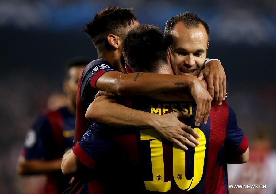 FC Barcelona took a relatively comfortable 3-1 win at home to Dutch side Ajax during the third round match in Group F at European champions league, in Barcelona, Spain, on Oct 21, 2014. (Xinhua)