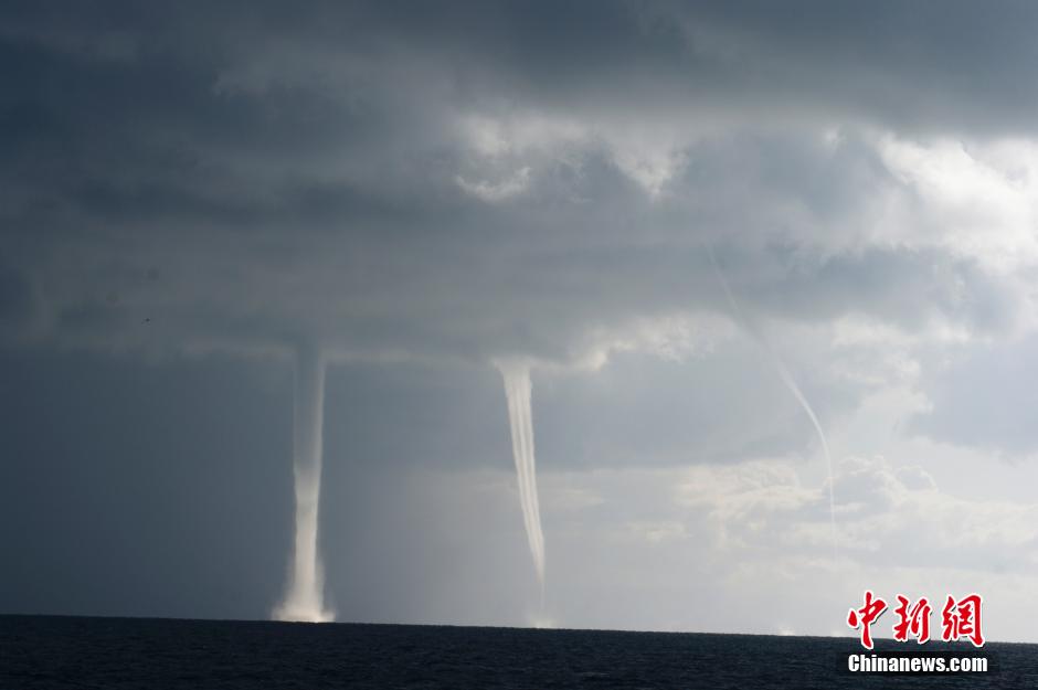 Waterspouts are seen on the Qinghai Lake, northwestern China's Gansu Province, October 20, 2014.