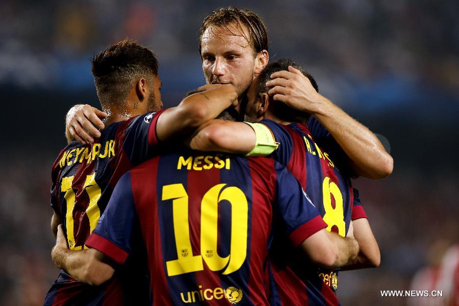 FC Barcelona took a relatively comfortable 3-1 win at home to Dutch side Ajax during the third round match in Group F at European champions league, in Barcelona, Spain, on Oct 21, 2014. (Xinhua)