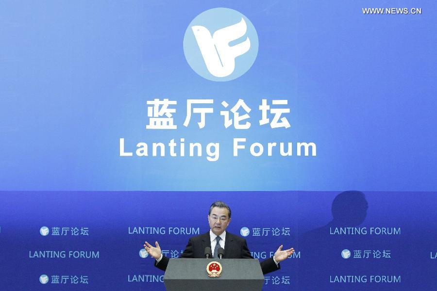 Chinese Foreign Minister Wang Yi speaks at the 10th Lanting Forum in Beijing, Oct. 29, 2014.