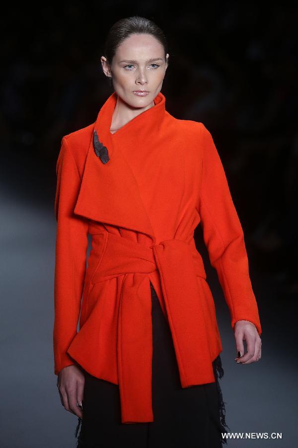 A model presents a creation of the winter collection of 'Uma Raquel Davidowicz' 2015 during the 38th Sao Paulo Fashion Week (SPFW), in Sao Paulo, Brazil, on Nov. 3, 2014. 
