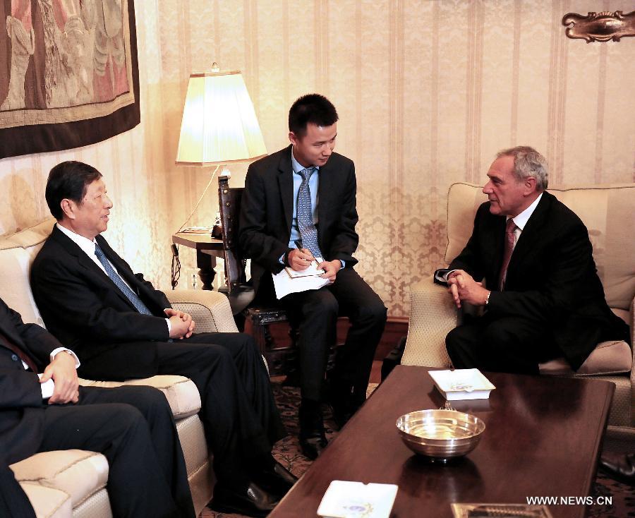 Vice Chairman of the Standing Committee of the National People's Congress of China Zhang Ping (L) meets with president of the Italian Senate Pietro Grasso (R), in Rome, Italy, Nov. 6, 2014.