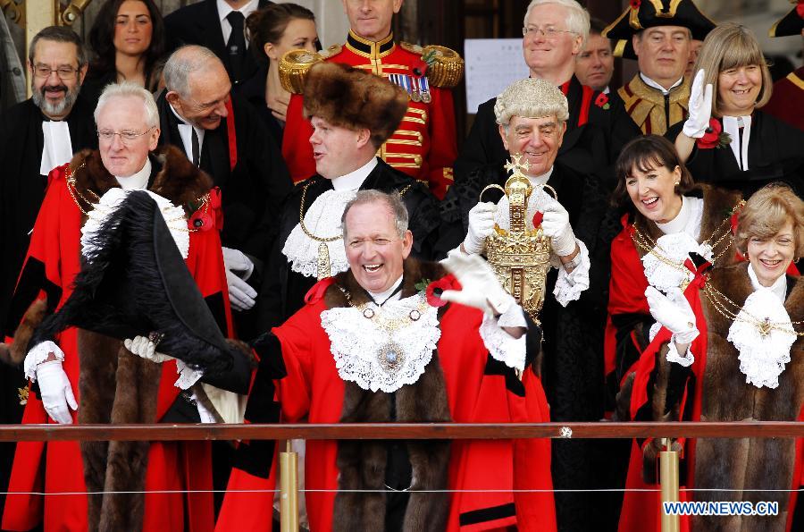 Alan Yarrow (C), the new Lord Mayor of London greets the crowd during the annual Lord Mayor's Show in London, Britain on Nov. 8, 2014.