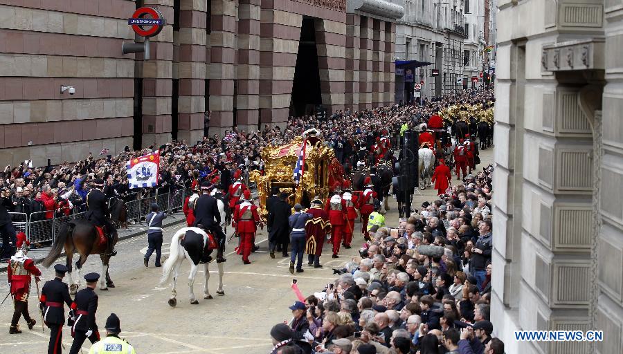 A golden State Coach carried Alan Yarrow, the new Lord Mayor of London, parades during the annual Lord Mayor's Show in London, Britain on Nov. 8, 2014.