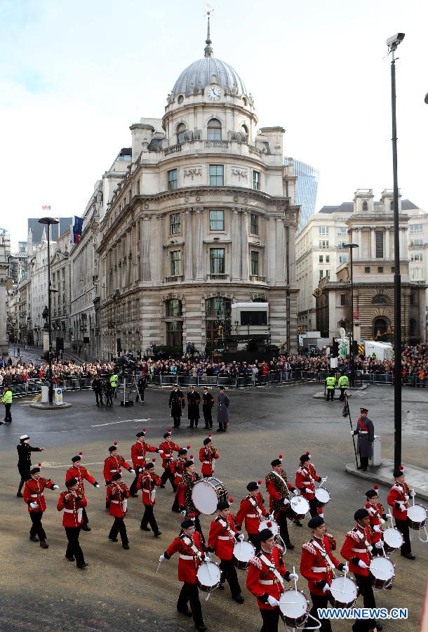 A military band parades during the annual Lord Mayor's Show in London, Britain on Nov. 8, 2014. 